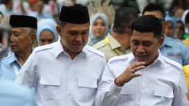 Bupati Kolaka Amri (kiri) dan pasangannya, wakil bupati Kolaka Husmaluddin (kanan).