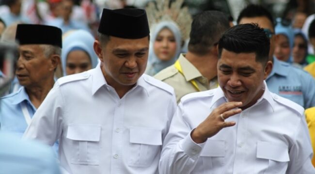 Bupati Kolaka Amri (kiri) dan pasangannya, wakil bupati Kolaka Husmaluddin (kanan).