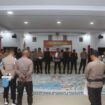 Kapolresta Kendari, Kombes Pol. Edwin L. Sengka, S.I.K., M.Si memimpin apel gelar pasukan pengamanan Rakornas Produk Hukum Daerah Tahun 2025. Endra/ Kolaka Pos