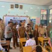 Bupati Kolaka menghadiri Launching MBG di kecamatan Wolo. Foto Diskominfo Kolaka